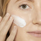 Shake before each use. Apply an even amount of product to face after moisturizing each morning. Can be worn alone or underneath make-up.